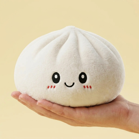 Squishy Dumpling Big – XXL Kuschelkissen 25 cm in der Hand gehalten, echte Größe