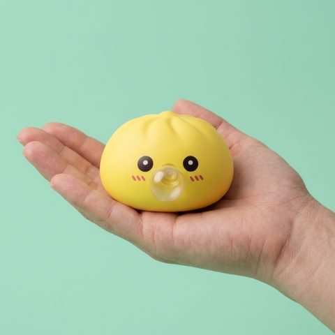 Jumbo Dumpling Squishy Gelb Riesig in der Hand gehalten, echte Größe
