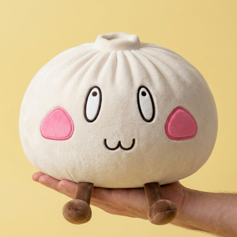 Dumpling Squishy XXL Fröhliches Gesicht in der Hand gehalten, echte Größe